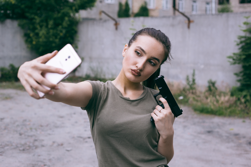 selfie with a gun