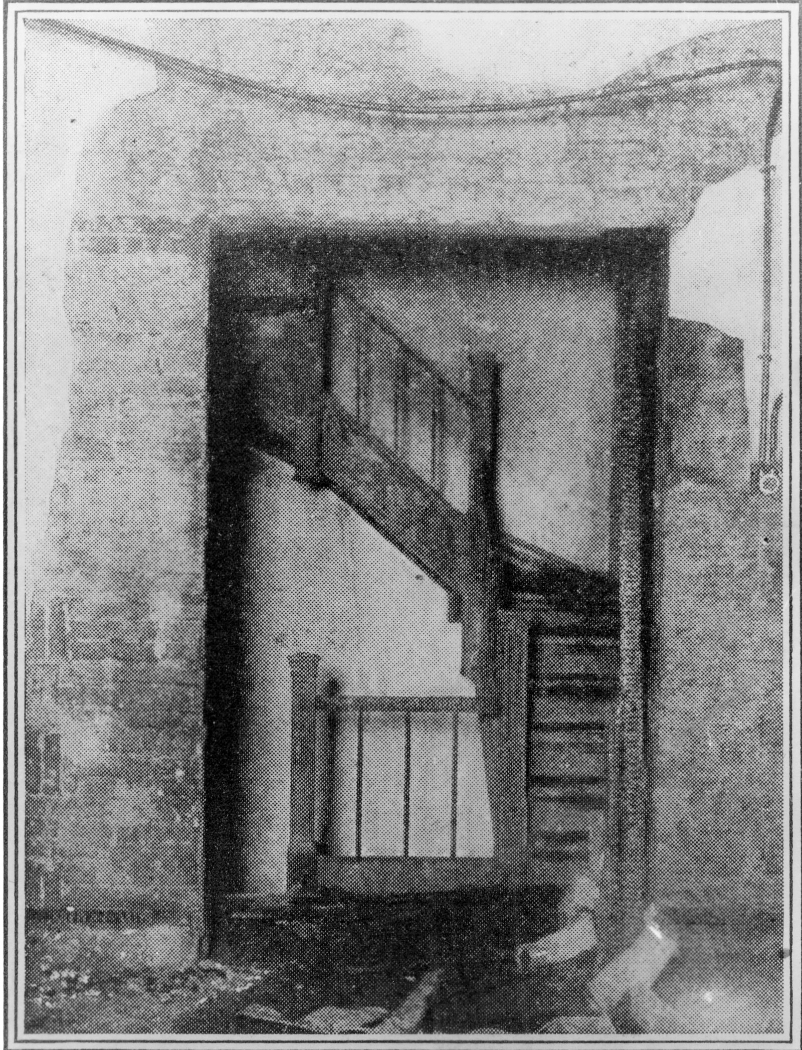 Title:  A newspaper photograph of an internal staircase in the Asch Building after the Triangle fire
 
             Date:  1911
           
