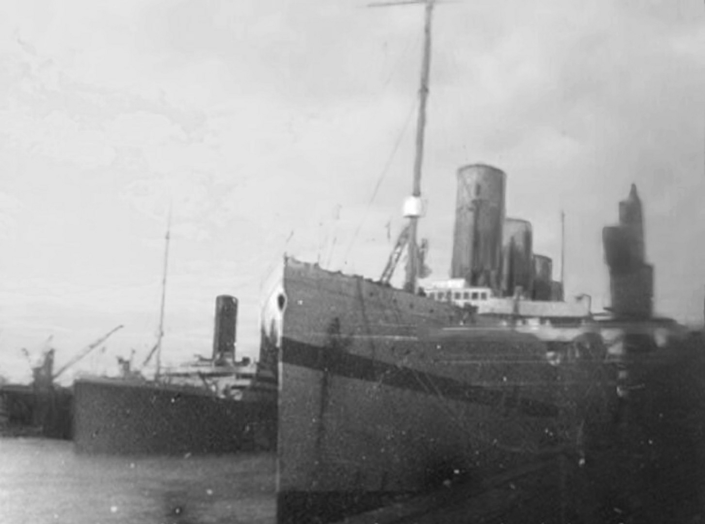 The only known picture of Titanic's sister ships Olympic (at left in the background) and Britannic (right) together after the latter's const