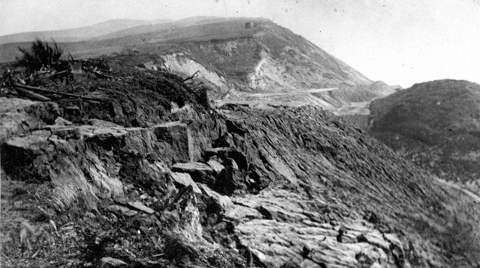 Landslide on steep hillside near Mussel Rock due to the  1906 San Francisco earthquake .
 This photograph was taken by the US Geological Sur